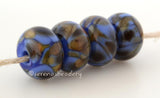 Mermaid Tale Dark blue lampwork glass beads with brown and dark olive green frit.Bead Size: 6x11-12 or 7x13-14 mmHole Size: 2.5 mmprice is for one bead with a discount for 4 or more 11-12 mm,Glossy,13-14 mm,Glossy,11-12 mm,Matte,13-14 mm,Matte