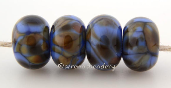 Mermaid Tale Dark blue lampwork glass beads with brown and dark olive green frit.Bead Size: 6x11-12 or 7x13-14 mmHole Size: 2.5 mmprice is for one bead with a discount for 4 or more 11-12 mm,Glossy,13-14 mm,Glossy,11-12 mm,Matte,13-14 mm,Matte