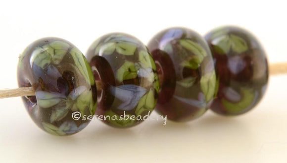 Nantahala Forest Deep purple lampwork glass beads with green and purple frit.Bead Size: 6x11-12 or 7x13-14 mmHole Size: 2.5 mmprice is for one bead with a discount for 4 or more 11-12 mm,Glossy,13-14 mm,Glossy,11-12 mm,Matte,13-14 mm,Matte
