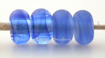 Ocean Color Notes: Streaky wispy blue 5x10 mm Available shapes and sizes:Round Bead Shapes: Available to order 8 to 15 mm with hole sizes ranging from 1.5 to 5 mm. See drop down menu for the exact options. Shown here in 8, 9 and 10 mm with both a 2.5 mm and 1.5 mm hole. 4 and 5 mm holes will fit European Charm style jewelry.Also available in a wavy disk or bead cap:. Pressed bead shapes:Lentil - 12x13 mm in size with a 1.5mm hole.: Pillow 13 mm square with a 1.5 mm hole.: Tab: Default Title