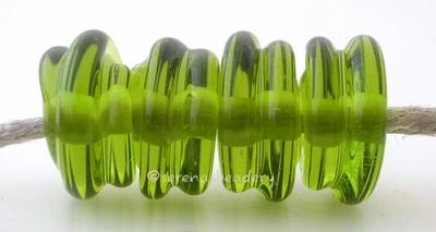Olive Raised Spirals transparent olive green beads with a raised spiral6x12 mmprice is per bead Glossy,Matte
