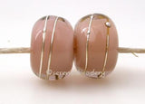 Pale Brown Ginger Age Old A layer of pale brown over ginger with a silver wrap.   6x12 mm with a 2.5 mm hole. Price is per bead. Glossy,Matte