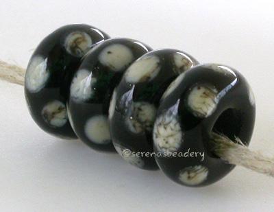 European Charm- Silvered Ivory Dice Dots A black base with silvered ivory dice dots. 6x14 mm with a 5mm hole Glossy,Matte