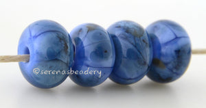 Periwinkle Denim Periwinkle covered in denim colored frit.Bead Size: 6x11-12 or 7x13-14 mmHole Size: 2.5 mmprice is for one bead with a discount for 4 or more 11-12 mm,Glossy,13-14 mm,Glossy,11-12 mm,Matte,13-14 mm,Matte