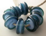 Double Blue Raised Spiral Periwinkle blue with a leaky pen raised spiral. 6x12 mm price is per bead Default Title