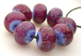 Periwinkle Pink Monet Periwinkle and pink monet rounds.   Bead Size: 6x12 mm Hole Size: 1.5 mm price is for one bead with a discount for 4 or more 11-12 mm,Glossy,11-12 mm,Matte