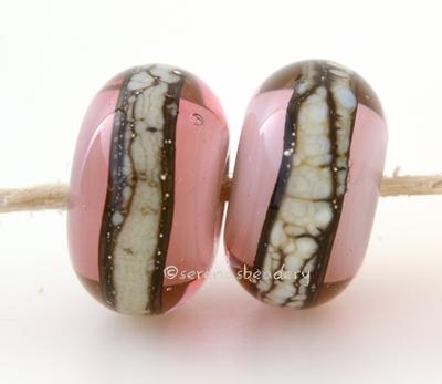 Pinky Peach Granite White Heart A peachy pink white heart bead with a stripe of silvered ivory granite6x12 mmprice is per bead Glossy,Matte