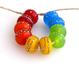Assorted Popsicles Silver Dots #2113 This fun rainbow assortment is similar to an assorted pack of popsicles.6x11 mm10 Beads2.5 mm hole Default Title