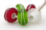 Green, Red & Clear Fine Silver Wraps A set of dark grass green, red and cyrstal clear white heart bead wrapped with strands of fine silver. 6x12 mm price is per 6 bead set Glossy,Matte