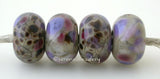 Impression Jasper Looks a whole lot like some impression jasper Ive seen before, but its all glass.Bead Size: 6x11-12 or 7x13-14 mmHole Size: 2.5 mmprice is for one bead with a discount for 4 or more 11-12 mm,Glossy,13-14 mm,Glossy,11-12 mm,Matte,13-14 mm,Matte