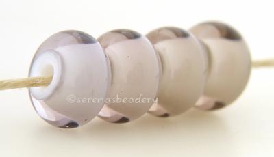Sepia White Heart sepia brown with a white heart6x12 mmprice is per bead Glossy,Matte