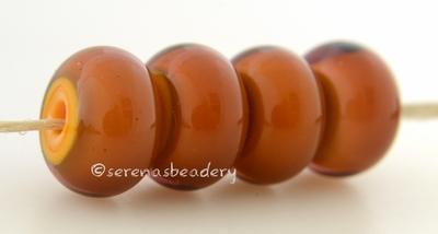 Squash Brown this is actually a layer of transparent amethyst glass over a squash yellow creating a gorgeous brown color6x12 mmprice is per bead Glossy,Matte