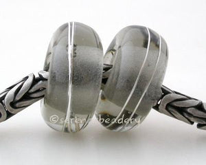 Transparent Grey Fine Silver Wrap European Charm Bead one transparent grey handmade lampwork glass european charm spacer bead with a fine silver wrap5x13mm with a 5mm holeprice is per bead Glossy,Matte