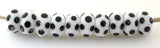 White Black Dice Dots #2117 A white base with black dice dots. 5x11 mm 4 beads This set is ready to ship. Default Title