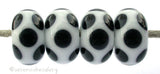 White Black Dice Dots #2117 A white base with black dice dots. 5x11 mm 4 beads This set is ready to ship. Default Title