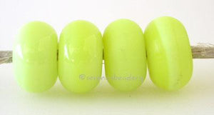 Astro Yellow Color Notes: an oddlot color that is no longer in production - once its gone, there will be no more  5x10 mmDonut- This is my basic spacer size.  It is made on a 3/32 mandrel with a 2.5 mm hole. Other available sizes and shapes:4x8 mm Round- A miniature sized spacer with a 1.5 mm hole.Lentil- 12x13 mm in size with a 1.5mm hole.Pillow- 14 mm square with a 1.5 mm hole.Disk- 3x13 mm with a 2.5 mm hole.Also6x12 mm donut- A larger donut with a 2.5 mm hole.8x15 mm Super Sized- A humungous spacer w