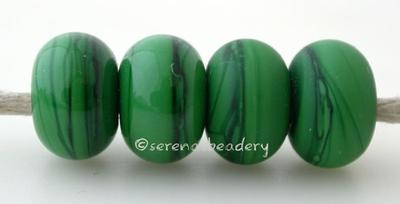 Green Mosaic Color Notes: streaky green 5x10 mm Available shapes and sizes:Round Bead Shapes: Available to order 8 to 15 mm with hole sizes ranging from 1.5 to 5 mm. See drop down menu for the exact options. Shown here in 8, 9 and 10 mm with both a 2.5 mm and 1.5 mm hole. 4 and 5 mm holes will fit European Charm style jewelry.Also available in a wavy disk or bead cap:. Pressed bead shapes:Lentil - 12x13 mm in size with a 1.5mm hole.: Pillow 13 mm square with a 1.5 mm hole.: Tab: Default Title