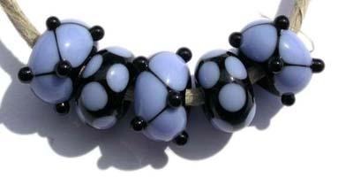 Brenda 5 black and periwinkle beads with dots and spots5x11 mmAvailable in a variety of colors. Black with your choice from the drop down menu. Glossy,1204 White,Glossy,1212 Pea Green,Glossy,1213 Mint Green,Glossy,1219 Copper Green,Glossy,1220 Periwinkle,Glossy,1221 Lavender,Glossy,1222 Dark Periwinkle,Glossy,1224 Light Sky Blue,Glossy,1232 Light Turquoise,Glossy,1247 Lavender Blue,Glossy,1248 Light Grey,Glossy,1260BG Bubblegum Pink,Glossy,1264 Ivory,Glossy,1414 Butternut,Glossy,1416 Bright Acid Yellow,Glos