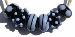 Chloe 6 black and periwinkle beads with spirals, mini dots and spots5x11 mmAvailable in a variety of colors. Black with your choice from the drop down menu. Glossy,1204 White,Glossy,1212 Pea Green,Glossy,1213 Mint Green,Glossy,1219 Copper Green,Glossy,1220 Periwinkle,Glossy,1221 Lavender,Glossy,1222 Dark Periwinkle,Glossy,1224 Light Sky Blue,Glossy,1232 Light Turquoise,Glossy,1247 Lavender Blue,Glossy,1248 Light Grey,Glossy,1260BG Bubblegum Pink,Glossy,1264 Ivory,Glossy,1414 Butternut,Glossy,1416 Bright Aci