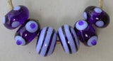 Robust a robust set 6 beads with spiral stripes and dots the above beads are cobalt and periwinkle 6x11 mm Also available in the following colors: teal-copper green amethyst- violet denim blue-pearly grey emerald- pea green amber- squash yellow Glossy,Cobalt-Periwinkle,Glossy,Teal-Copper Green,Glossy,Amethyst-Violet,Glossy,Emerald-Pea Green,Glossy,Amber-Squash Yellow,Matte,Cobalt-Periwinkle,Matte,Teal-Copper Green,Matte,Amethyst-Violet,Matte,Emerald-Pea Green,Matte,Amber-Squash Yellow