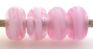 Pretty in Pink Color Notes: an oddlot color that is no longer in production - once its gone, there will be no more 5x10 mm Available shapes and sizes:Round Bead Shapes: Available to order 8 to 15 mm with hole sizes ranging from 1.5 to 5 mm. See drop down menu for the exact options. Shown here in 8, 9 and 10 mm with both a 2.5 mm and 1.5 mm hole. 4 and 5 mm holes will fit European Charm style jewelry.Also available in a wavy disk or bead cap:. Pressed bead shapes:Lentil - 12x13 mm in size with a 1.5mm hole.: