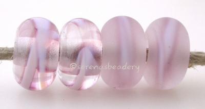 Purple Ribbon Color Notes: purple with blue streaks 5x10 mm Available shapes and sizes:Round Bead Shapes: Available to order 8 to 15 mm with hole sizes ranging from 1.5 to 5 mm. See drop down menu for the exact options. Shown here in 8, 9 and 10 mm with both a 2.5 mm and 1.5 mm hole. 4 and 5 mm holes will fit European Charm style jewelry.Also available in a wavy disk or bead cap:. Pressed bead shapes:Lentil - 12x13 mm in size with a 1.5mm hole.: Pillow 13 mm square with a 1.5 mm hole.: Tab: Default Title