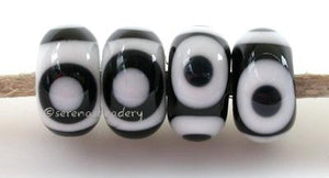 Black and White Eye Dots white beads with black and white round dots or black beads with white and black round dots 5x11 mm if you choose to reverse the colors, you will get the ones on the right price is per bead Glossy,No,Glossy,Yes,Matte,No,Matte,Yes