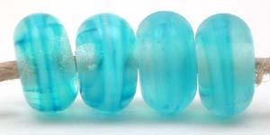 Aqua Ribbon Color Notes: aqua ribbon cased in clear 5x10 mm Available shapes and sizes:Round Bead Shapes: Available to order 8 to 15 mm with hole sizes ranging from 1.5 to 5 mm. See drop down menu for the exact options. Shown here in 8, 9 and 10 mm with both a 2.5 mm and 1.5 mm hole. 4 and 5 mm holes will fit European Charm style jewelry.Also available in a wavy disk or bead cap:. Pressed bead shapes:Lentil - 12x13 mm in size with a 1.5mm hole.: Pillow 13 mm square with a 1.5 mm hole.: Tab: Default Title