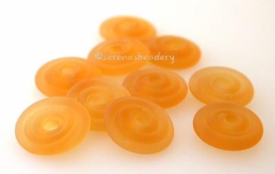 Light Amber Matte Wavy Disk Spacer  10 wavy disks in light amber with a matte finish2 sizes available: 11-12 mm with 1.5 mm hole or 13-14 mm with 2.5 mm holeprice is per 10 disks 11-12 mm 1.5 mm hole,12-13 mm 2.5 mm hole