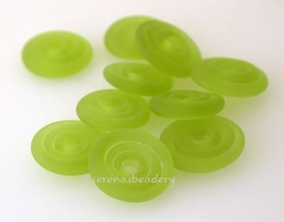 Olive Matte Wavy Disk Spacer  10 wavy disks in a transparent olive with a matte finish2 sizes available: 11-12 mm with 1.5 mm hole or 13-14 mm with 2.5 mm holeprice is per 10 disks 11-12 mm 1.5 mm hole,12-13 mm 2.5 mm hole