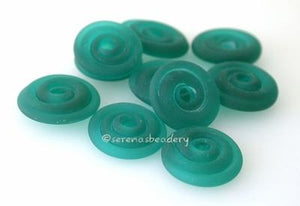 Dark Teal Matte Wavy Disk Spacer  10 wavy disks in dark teal with a matte finish2 sizes available: 11-12 mm with 1.5 mm hole or 13-14 mm with 2.5 mm holeprice is per 10 disks 11-12 mm 1.5 mm hole,12-13 mm 2.5 mm hole
