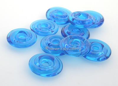 Dark Aqua Wavy Disk Spacer 10 wavy disks in dark aqua 2 sizes available: 11-12 mm with 1.5 mm hole or 13-14 mm with 2.5 mm holeprice is per 10 disks 11-12 mm 1.5 mm hole,12-13 mm 2.5 mm hole