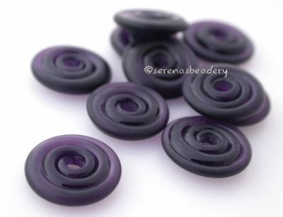 Violet Dark Tumbled Wavy Disk Spacer 10 tumbled wavy disks in dark violet2 sizes available: 11-12 mm with 1.5 mm hole or 13-14 mm with 2.5 mm holeprice is per 10 disks 11-12 mm 1.5 mm hole,12-13 mm 2.5 mm hole