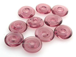 Amethyst Wavy Disk Spacer  10 wavy disks in amethyst2 sizes available: 11-12 mm with 1.5 mm hole or 13-14 mm with 2.5 mm holeprice is per 10 disks 11-12 mm 1.5 mm hole,12-13 mm 2.5 mm hole
