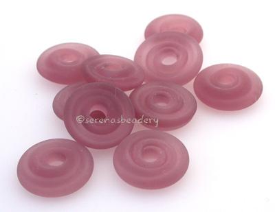 Amethyst Matte Wavy Disk Spacer  10 wavy disks in amethyst matte2 sizes available: 11-12 mm with 1.5 mm hole or 13-14 mm with 2.5 mm holeprice is per 10 disks 11-12 mm 1.5 mm hole,12-13 mm 2.5 mm hole