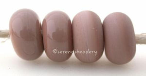 Mudslide Color Notes: feathery pink 5x10 mm Available shapes and sizes:Round Bead Shapes: Available to order 8 to 15 mm with hole sizes ranging from 1.5 to 5 mm. See drop down menu for the exact options. Shown here in 8, 9 and 10 mm with both a 2.5 mm and 1.5 mm hole. 4 and 5 mm holes will fit European Charm style jewelry.Also available in a wavy disk or bead cap:. Pressed bead shapes:Lentil - 12x13 mm in size with a 1.5mm hole.: Pillow 13 mm square with a 1.5 mm hole.: Tab: Default Title