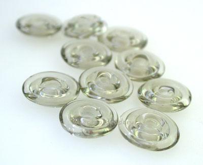 Grey Wavy Disk Spacer  10 wavy disks in transparent grey2 sizes available: 11-12 mm with 1.5 mm hole or 13-14 mm with 2.5 mm holeprice is per 10 disks 11-12 mm 1.5 mm hole,12-13 mm 2.5 mm hole