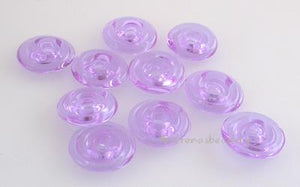 Dark Lavender Wavy Disk Spacer  10 wavy disks in dark lavender2 sizes available: 11-12 mm with 1.5 mm hole or 13-14 mm with 2.5 mm holeprice is per 10 disks 11-12 mm 1.5 mm hole,12-13 mm 2.5 mm hole