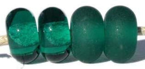 Dark Teal Color Notes: very dark blue green 5x10 mm Available shapes and sizes:Round Bead Shapes: Available to order 8 to 15 mm with hole sizes ranging from 1.5 to 5 mm. See drop down menu for the exact options. Shown here in 8, 9 and 10 mm with both a 2.5 mm and 1.5 mm hole. 4 and 5 mm holes will fit European Charm style jewelry.Also available in a wavy disk or bead cap:. Pressed bead shapes:Lentil - 12x13 mm in size with a 1.5mm hole.: Pillow 13 mm square with a 1.5 mm hole.: Tab: Default Title