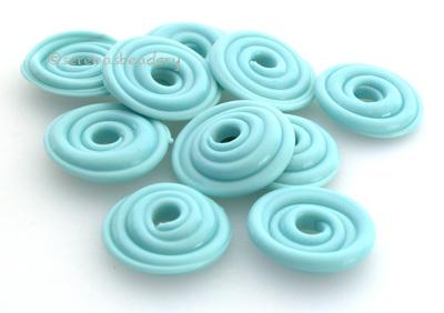 Light Turquoise Wavy Disk Spacer 10 wavy disks in light turquoise2 sizes available: 11-12 mm with 1.5 mm hole or 13-14 mm with 2.5 mm holeprice is per 10 disks 11-12 mm 1.5 mm hole,12-13 mm 2.5 mm hole