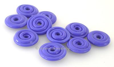 Light Cobalt Wavy Disk Spacer 10 wavy disks in light cobalt2 sizes available: 11-12 mm with 1.5 mm hole or 13-14 mm with 2.5 mm holeprice is per 10 disks 11-12 mm 1.5 mm hole,12-13 mm 2.5 mm hole