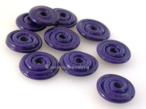 Dark Cobalt Wavy Disk Spacer 10 wavy disks in dark cobalt2 sizes available: 11-12 mm with 1.5 mm hole or 13-14 mm with 2.5 mm holeprice is per 10 disks 11-12 mm 1.5 mm hole,12-13 mm 2.5 mm hole