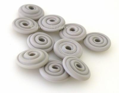 Opaque Light Grey Matte Wavy Disk Spacer 10 wavy disks in opaque light grey with a matte finish2 sizes available: 11-12 mm with 1.5 mm hole or 13-14 mm with 2.5 mm holeprice is per 10 disks 11-12 mm 1.5 mm hole,12-13 mm 2.5 mm hole