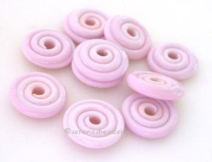 Bubble Gum Pink Wavy Disk Spacer 10 wavy disks in bubble gum pink2 sizes available: 11-12 mm with 1.5 mm hole or 13-14 mm with 2.5 mm holeprice is per 10 disks 11-12 mm 1.5 mm hole,12-13 mm 2.5 mm hole