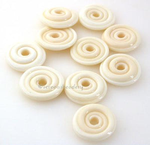 Light Ivory Wavy Disk Spacer 10 wavy disks in light ivory2 sizes available: 11-12 mm with 1.5 mm hole or 13-14 mm with 2.5 mm holeprice is per 10 disks 11-12 mm 1.5 mm hole,12-13 mm 2.5 mm hole