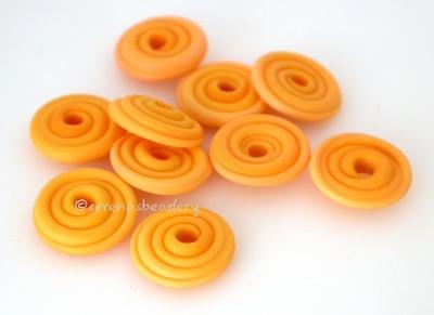 Squash Orange Matte Wavy Disk Spacer 10 wavy disks in squash orange with a matte finish2 sizes available: 11-12 mm with 1.5 mm hole or 13-14 mm with 2.5 mm holeprice is per 10 disks 11-12 mm 1.5 mm hole,12-13 mm 2.5 mm hole