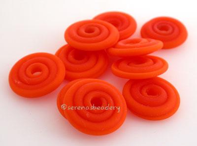 Carrot Red Matte Wavy Disk Spacer 10 wavy disks in carrot red with a matte finish2 sizes available: 11-12 mm with 1.5 mm hole or 13-14 mm with 2.5 mm holeprice is per 10 disks 11-12 mm 1.5 mm hole,12-13 mm 2.5 mm hole