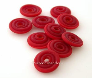 Dark Red Matte Wavy Disk Spacer 10 wavy disks in dark red with a matte finish2 sizes available: 11-12 mm with 1.5 mm hole or 13-14 mm with 2.5 mm holeprice is per 10 disks 11-12 mm 1.5 mm hole,12-13 mm 2.5 mm hole