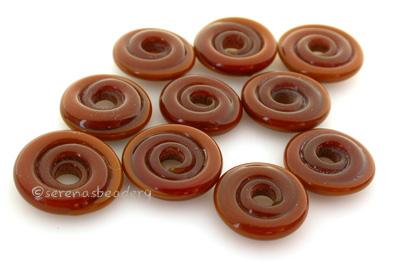 Chestnut Brown Wavy Disk Spacer 10 wavy disks in chestnut brown2 sizes available: 11-12 mm with 1.5 mm hole or 13-14 mm with 2.5 mm holeprice is per 10 disks 11-12 mm 1.5 mm hole,12-13 mm 2.5 mm hole