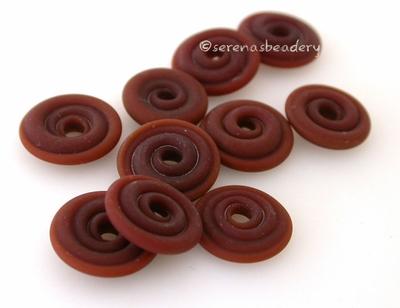 Chestnut Brown Matte Wavy Disk Spacer 10 wavy disks in chestnut brown with a matte finish2 sizes available: 11-12 mm with 1.5 mm hole or 13-14 mm with 2.5 mm holeprice is per 10 disks 11-12 mm 1.5 mm hole,12-13 mm 2.5 mm hole